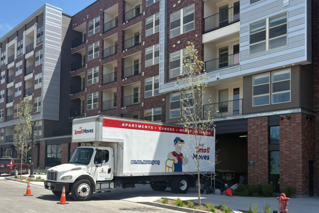 Salt Lake City Movers Truck at large apartment building