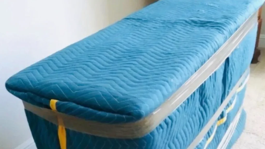 Movers in Salt Lake City Protecting furniture with moving blankets