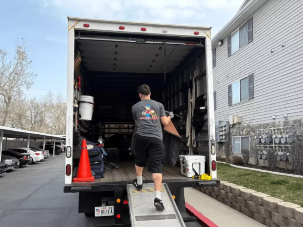 moving companies salt lake city worker packing truck